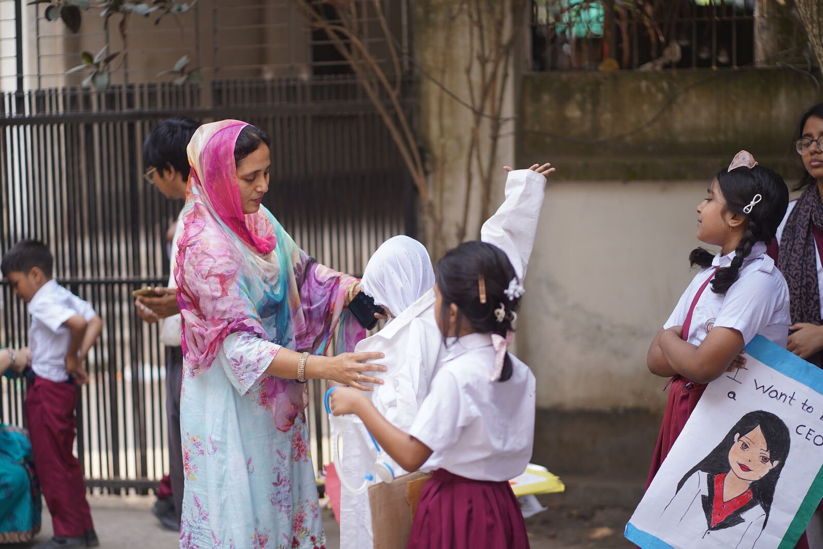 A teacher guiding students